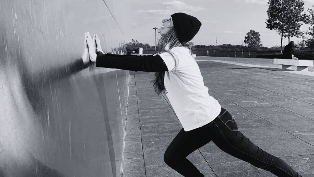 woman on the side of the st. louis arch